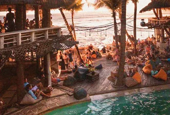 Sunset at a Canggu beach club on the sand